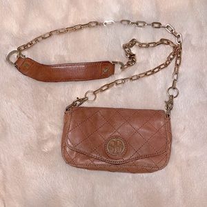 Tory Burch tan leather purse.